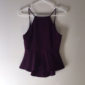 Plum colored peplum top, swoop back